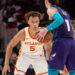 Oct 25, 2024; Atlanta, Georgia, USA; Atlanta Hawks guard Dyson Daniels (5) plays defense against Charlotte Hornets guard LaMelo Ball (1) during the fourth quarter at State Farm Arena. Mandatory Credit: Jordan Godfree-Imagn Images