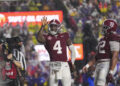 Alabama quarterback Jalen Milroe (4) celebrates his touchdown carry in the first half an NCAA college football game against LSU in Baton Rouge, La., Saturday, Nov. 9, 2024. (AP Photo/Gerald Herbert)