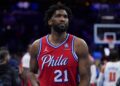 Joel Embiid walks off the court