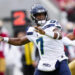 SANTA CLARA, CALIFORNIA - NOVEMBER 17: Geno Smith #7 of the Seattle Seahawks throws a pass in the second quarter of a game against the San Francisco 49ers at Levi's Stadium on November 17, 2024 in Santa Clara, California. (Photo by Thearon W. Henderson/Getty Images)