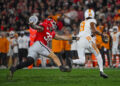 ATHENS, GA - NOVEMBER 16: Georgia Bulldogs linebacker Chaz Chambliss (32) puts pressure on Tennessee Volunteers quarterback Nico Iamaleava (8) during the college football game between the Tennessee Volunteers and the Georgia Bulldogs on November 16, 2024, on Dooley Field at Sanford Stadium in Athens, GA. (Photo by John Adams/Icon Sportswire via Getty Images)