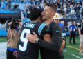 CHARLOTTE, NORTH CAROLINA - NOVEMBER 03: Head coach Dave Canales and Bryce Young #9 of the Carolina Panthers embrace after a win over the New Orleans Saints at Bank of America Stadium on November 03, 2024 in Charlotte, North Carolina. (Photo by Grant Halverson/Getty Images)