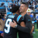 CHARLOTTE, NORTH CAROLINA - NOVEMBER 03: Head coach Dave Canales and Bryce Young #9 of the Carolina Panthers embrace after a win over the New Orleans Saints at Bank of America Stadium on November 03, 2024 in Charlotte, North Carolina. (Photo by Grant Halverson/Getty Images)