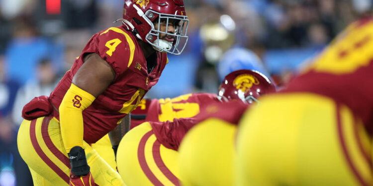 PASADENA, CALIFORNIA - NOVEMBER 23:  Woody Marks #4 of the USC Trojans  lines up for a play during the first half of a game against the UCLA Bruins at the Rose Bowl on November 23, 2024 in Pasadena, California.  (Photo by Sean M. Haffey/Getty Images)