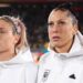 Alexia Putellas and Jennifer Hermoso of Spain line up for the national anthem