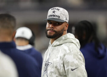 Dallas Cowboys quarterback Dak Prescott watches play against the Philadelphia Eagles in the second half of an NFL football game in Arlington, Texas, Sunday, Nov. 10, 2024. (AP Photo/Jeffrey McWhorter)