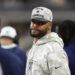 Dallas Cowboys quarterback Dak Prescott watches play against the Philadelphia Eagles in the second half of an NFL football game in Arlington, Texas, Sunday, Nov. 10, 2024. (AP Photo/Jeffrey McWhorter)