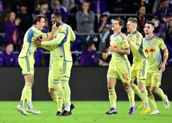 ORLANDO, FLORIDA - NOVEMBER 30: Andrés Reyes #4 of the New York Red Bulls celebrates with teammates after scoring a goal against Orlando City during the second half at Exploria Stadium on November 30, 2024 in Orlando, Florida. (Photo by Julio Aguilar/Getty Images)