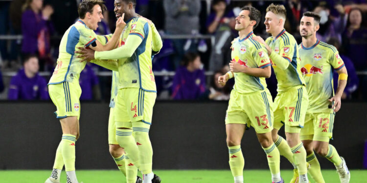 ORLANDO, FLORIDA - NOVEMBER 30: Andrés Reyes #4 of the New York Red Bulls celebrates with teammates after scoring a goal against Orlando City during the second half at Exploria Stadium on November 30, 2024 in Orlando, Florida. (Photo by Julio Aguilar/Getty Images)