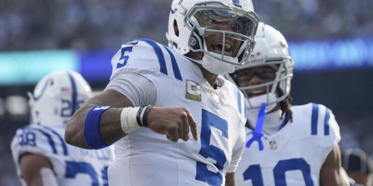 Indianapolis Colts quarterback Anthony Richardson (5) reacts after scoring a touchdown against the New York Jets during the second quarter of an NFL football game, Sunday, Nov. 17, 2024, in East Rutherford, N.J. (AP Photo/Seth Wenig)