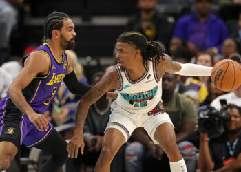 Ja Morant landed awkwardly under the rim after trying to throw down a dunk in the second half of their matchup with the Lakers.