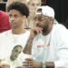 PARIS, FRANCE - AUGUST 8: Carmelo Anthony and his son Kiyan Anthony (left) attend the Men's Basketball semifinal game between Team France and Team Germany on day thirteen of the Olympic Games Paris 2024 at Bercy Arena on August 8, 2024 in Paris, France. (Photo by Jean Catuffe/Getty Images)