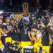 The Los Angeles Lakers' LeBron James holds up the winning trophy along with teammates after defeating the Indiana Pacers in their NBA in-season tournament championship game at T-Mobile Arena on Dec. 9, 2023, in Las Vegas. (L.E. Baskow/Las Vegas Review-Journal/Tribune News Service via Getty Images)