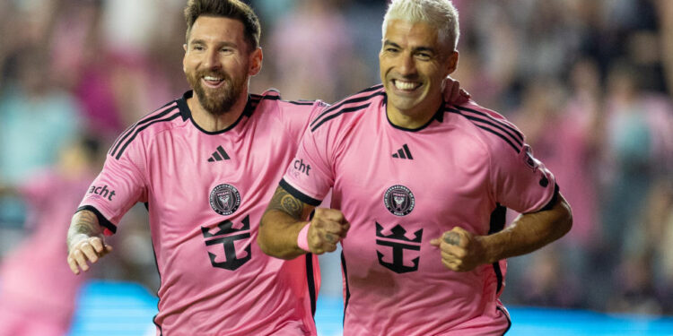 FORT LAUDERDALE, FLORIDA - OCTOBER 25: Lionel Messi celebrates Luis Suarez goal for Inter Miami CF (2) during round one of the 2024 MLS playoff game against Atlanta United FC (1) at the Chase Stadium on October 25th, 2024 in Fort Lauderdale, Florida, USA. (Photo by Simon Bruty/Anychance/Getty Images)