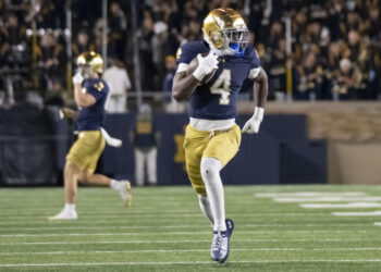 SOUTH BEND, IN - NOVEMBER 16: Notre Dame Fighting Irish running back Jeremiyah Love (4) runs the ball for a touchdown during the game between the Notre Dame Fighting Irish and the Virginia Cavaliers at Notre Dame Stadium in South Bend, IN on November 16, 2024. (Photo by Joseph Weiser/Icon Sportswire via Getty Images)