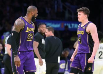 Los Angeles, California November 19, 2024-Lakers LeBron James, left, celebrates Dalton Knecht's three-pointer against the Jazz in the second half at Crypto.com Arena Tuesday. (Wally Skalij/Los Angeles Times)