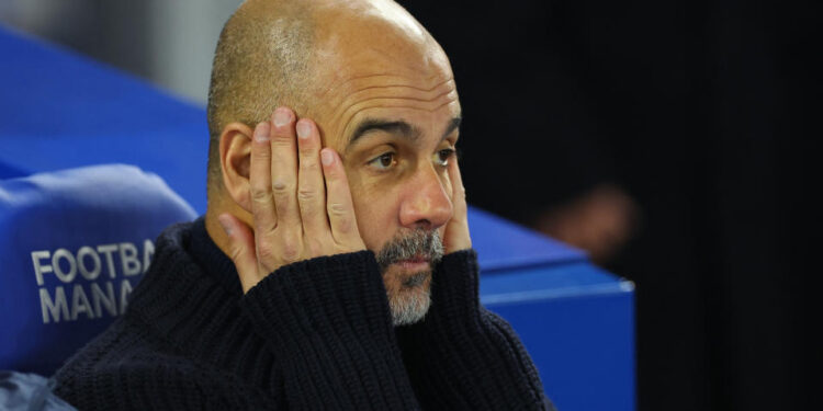 Soccer Football - Premier League - Brighton & Hove Albion v Manchester City - The American Express Community Stadium, Brighton, Britain - November 9, 2024 Manchester City manager Pep Guardiola before the match REUTERS/Toby Melville EDITORIAL USE ONLY. NO USE WITH UNAUTHORIZED AUDIO, VIDEO, DATA, FIXTURE LISTS, CLUB/LEAGUE LOGOS OR 'LIVE' SERVICES. ONLINE IN-MATCH USE LIMITED TO 120 IMAGES, NO VIDEO EMULATION. NO USE IN BETTING, GAMES OR SINGLE CLUB/LEAGUE/PLAYER PUBLICATIONS. PLEASE CONTACT YOUR ACCOUNT REPRESENTATIVE FOR FURTHER DETAILS..