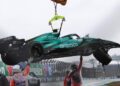 Autodromo Jose Carlos Pace, Sao Paulo, Brazil - November 3, 2024 Aston Martin's Fernando Alonso car is towed away by marshals after crashing out during qualifying