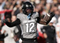 BOULDER, COLORADO - NOVEMBER 16: Travis Hunter #12 of Colorado Buffaloes celebrates catching a pass during the second quarter against the Utah Utes at Folsom Field on November 16, 2024 in Boulder, Colorado. (Photo by Andrew Wevers/Getty Images)