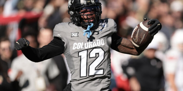 BOULDER, COLORADO - NOVEMBER 16: Travis Hunter #12 of Colorado Buffaloes celebrates catching a pass during the second quarter against the Utah Utes at Folsom Field on November 16, 2024 in Boulder, Colorado. (Photo by Andrew Wevers/Getty Images)