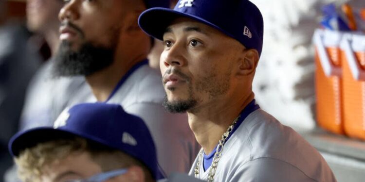 LOS ANGELES, CA - OCTOBER 28, 2024: Los Angeles Dodgers shortstop Mookie Betts (50) in the dugout prior to the game. Game 3 of the World Series against the Yankees at Yankees Stadium in New York City Monday, October 28 2024. (Robert Gauthier/Los Angeles Times)