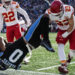 Kansas City Chiefs linebacker Drue Tranquill (23) hits Carolina Panthers tight end Ja'Tavion Sanders (0) during the first half of an NFL football game, Sunday, Nov. 24, 2024, in Charlotte, N.C. Sanders, was taken off the field due to injury after the play. (AP Photo/Rusty Jones)