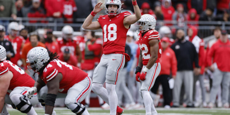 COLUMBUS, OH - NOVEMBER 23: Ohio State Buckeyes quarterback Will Howard (18) directs the offense before the snap during a college football game against the Indiana Hoosiers on November 23, 2024 at Ohio Stadium in Columbus, Ohio. (Photo by Joe Robbins/Icon Sportswire via Getty Images)