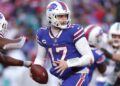 Josh Allen drops back to pass