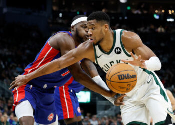 Giannis Antetokounmpo had a big night even by his lofty standards. (John Fisher/Getty Images)