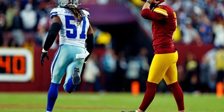 <span>Austin Seibert takes in his second missed extra point against the Dallas Cowboys.</span><span>Photograph: Peter Casey/USA Today Sports</span>