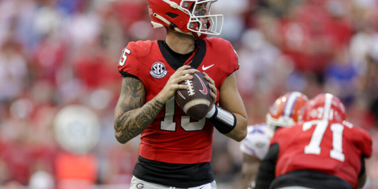 JACKSONVILLE, FL - NOVEMBER 02: Georgia Bulldogs quarterback Carson Beck (15) looks for a receiver during the game between the Georgia Bulldogs and the Florida Gators on November 2, 2024 at EverBank Stadium in Jacksonville, Fl. (Photo by David Rosenblum/Icon Sportswire via Getty Images)