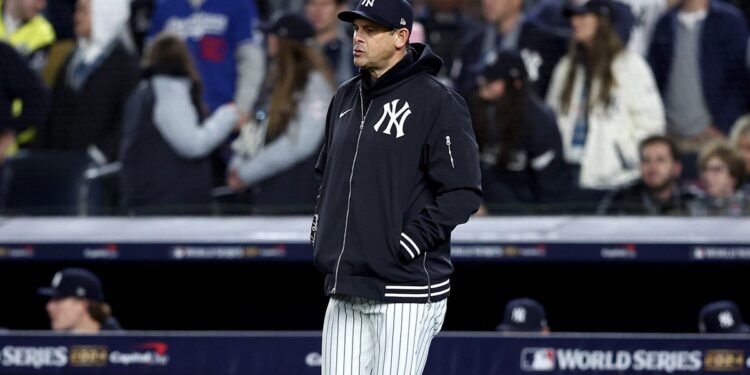 Aaron Boone walks