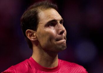 An emotional Rafael Nadal watches a tribute video after retiring from tennis