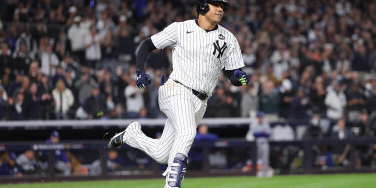 NEW YORK, NEW YORK - OCTOBER 29:  Juan Soto #22 of the New York Yankees doubles during the eighth inning of Game Four of the 2024 World Series against the Los Angeles Dodgers at Yankee Stadium on October 29, 2024 in the Bronx borough of New York City. (Photo by Sarah Stier/Getty Images)