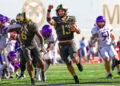 WEST POINT, NEW YORK - OCTOBER 19: Bryson Daily #13 of the Army Black Knights celebrates as he scores a touchdown during the second half of a football game against the East Carolina Pirates at Michie Stadium on October 19, 2024 in West Point, New York. (Photo by David Jensen/Getty Images)