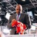 Charles Barkley signs a jersey