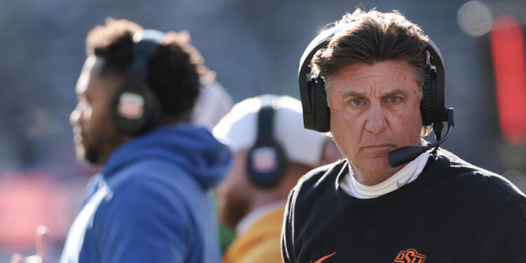 BOULDER, COLORADO - NOVEMBER 29: Head coach Mike Gundy of the Oklahoma State Cowboys looks on during the first quarter against the Colorado Buffaloes at Folsom Field on November 29, 2024 in Boulder, Colorado. (Photo by Andrew Wevers/Getty Images)