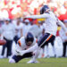 Wil Lutz #3 of the Denver Broncos attempts a field goal that was blocked in the fourth quarter of a game against the Kansas City Chiefs at GEHA Field at Arrowhead Stadium on November 10, 2024 in Kansas City, Missouri. (Photo by Jamie Squire/Getty Images)