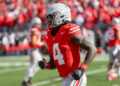 COLUMBUS, OH - OCTOBER 26: Ohio State Buckeyes wide receiver Jeremiah Smith (4) runs off the field after scoring a touchdown during the game against the Nebraska Cornhuskers and the Ohio State Buckeyes on October 26, 2024, at Ohio Stadium in Columbus, OH. (Photo by Ian Johnson/Icon Sportswire via Getty Images)