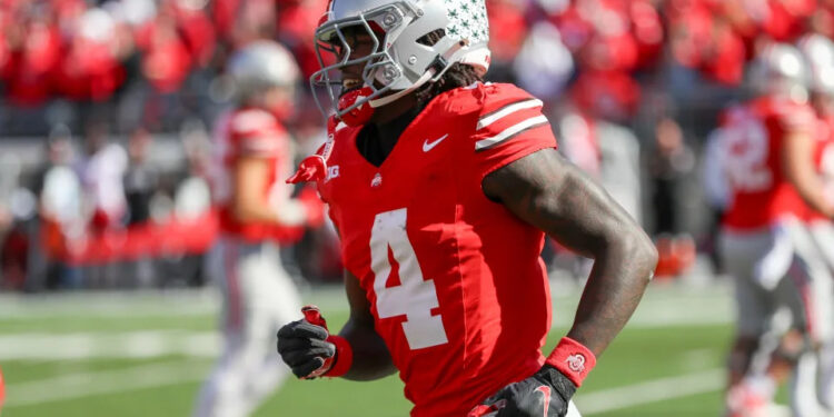 COLUMBUS, OH - OCTOBER 26: Ohio State Buckeyes wide receiver Jeremiah Smith (4) runs off the field after scoring a touchdown during the game against the Nebraska Cornhuskers and the Ohio State Buckeyes on October 26, 2024, at Ohio Stadium in Columbus, OH. (Photo by Ian Johnson/Icon Sportswire via Getty Images)