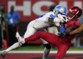 Houston Texans wide receiver John Metchie III catches a 15-yard touchdown pass in front of Detroit Lions cornerback Terrion Arnold. (AP Photo/David J. Phillip)