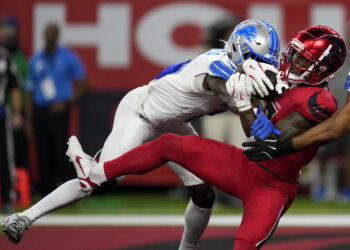 Houston Texans wide receiver John Metchie III catches a 15-yard touchdown pass in front of Detroit Lions cornerback Terrion Arnold. (AP Photo/David J. Phillip)