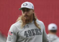 San Francisco 49ers tight end George Kittle wears a Salute to Service logo while warming up before an NFL football game against the Seattle Seahawks in Santa Clara, Calif., Sunday, Nov. 17, 2024. (AP Photo/Jed Jacobsohn)