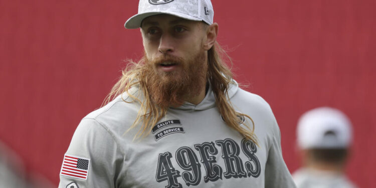 San Francisco 49ers tight end George Kittle wears a Salute to Service logo while warming up before an NFL football game against the Seattle Seahawks in Santa Clara, Calif., Sunday, Nov. 17, 2024. (AP Photo/Jed Jacobsohn)