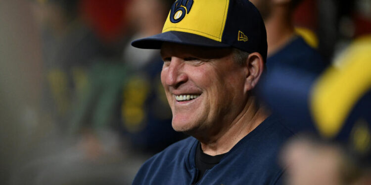 PHOENIX, ARIZONA - SEPTEMBER 13: Manager Pat Murphy #21 of the Milwaukee Brewers looks on from the dugout against the Arizona Diamondbacks at Chase Field on September 13, 2024 in Phoenix, Arizona. (Photo by Norm Hall/Getty Images)