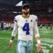 Dak Prescott walks off field