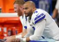 Dak Prescott sits on bench