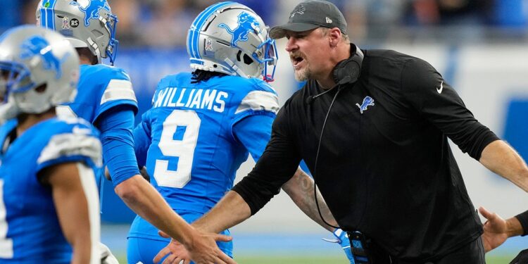 Dan Campbell with his players