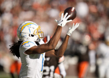 Los Angeles Chargers wide receiver Quentin Johnston (1) catches a 66-yard touchdown pass against the Cleveland Browns in the first half of an NFL football game Sunday, Nov. 3, 2024, in Cleveland. (AP Photo/Sue Ogrocki)