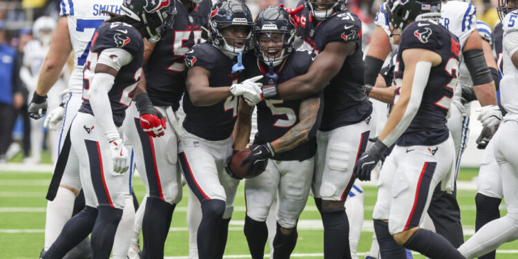 Houston Texans safety Jalen Pitre (5) celebrates his interception in the second quarter during the NFL game between the Indianapolis Colts and Houston Texans on October 27, 2024 at NRG Stadium in Houston, Texas.  (Photo by Leslie Plaza Johnson/Icon Sportswire via Getty Images)